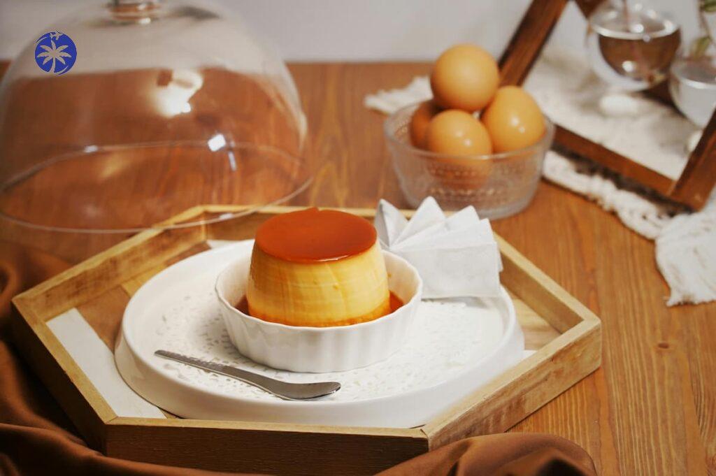 Imagem mostra delicioso pudim de leite condensado, como os preparados em fogão a lenha em Buenos Aires Guarapari.